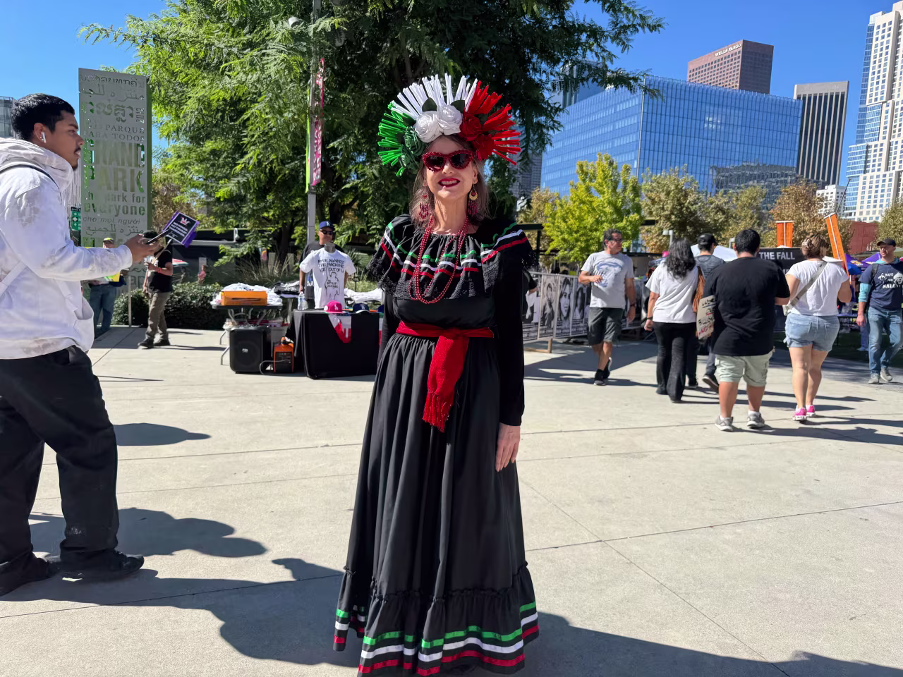 Maria Rivera Cummings attends a protest in Los Angeles on Saturday.