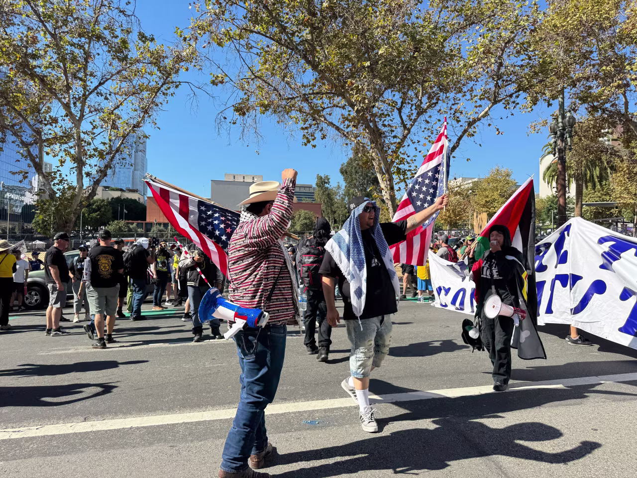 People gather in front of Los Angles City Hall on Saturday.