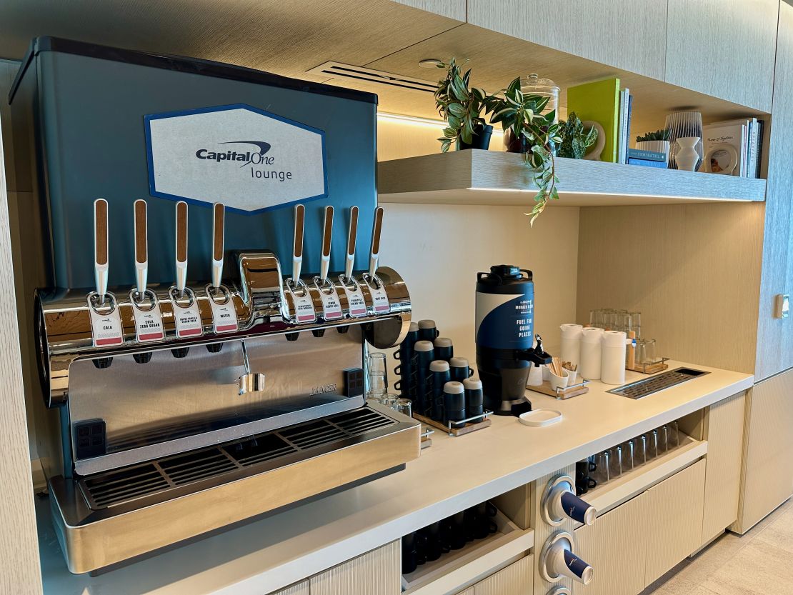 A photo of a soda machine and a drip coffee dispenser at the Capital One Lounge in Denver