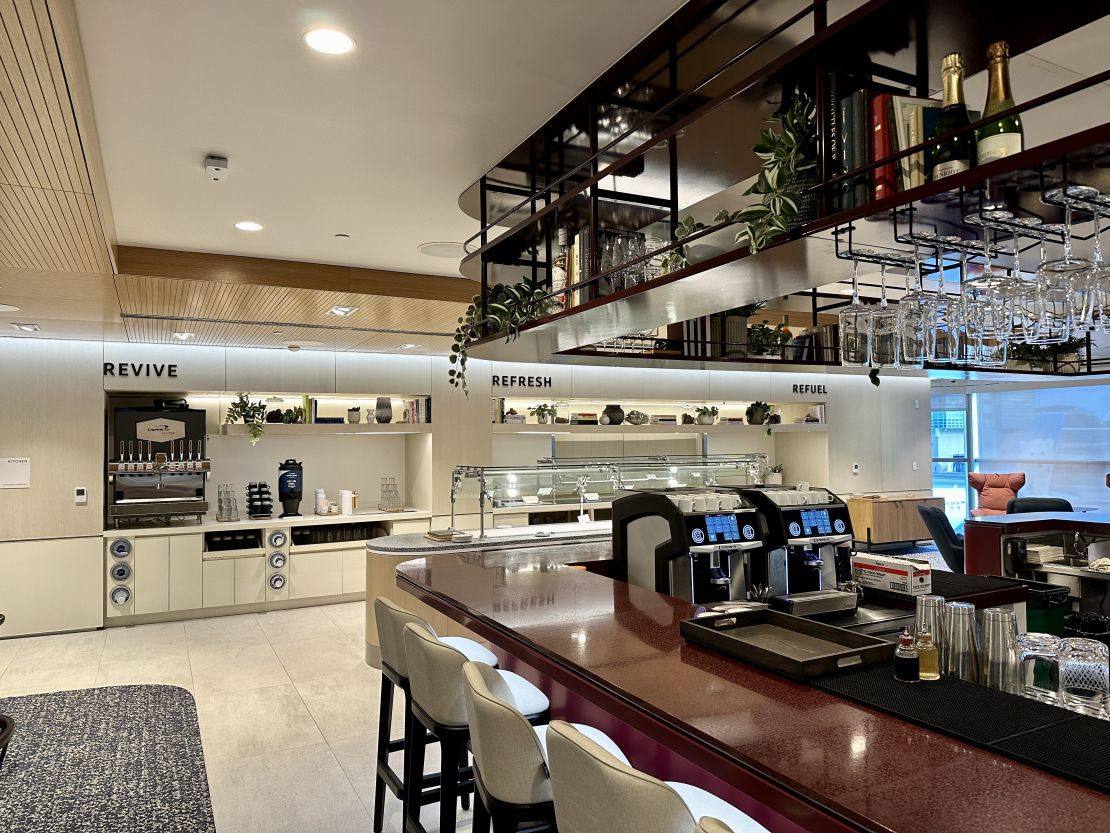 A photo of the bar and food area at the Capital One Lounge in Denver