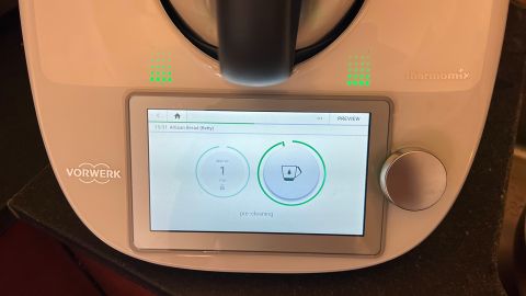 Close up of the display of a Thermomix TM6, showing a preliminary step in a recipe