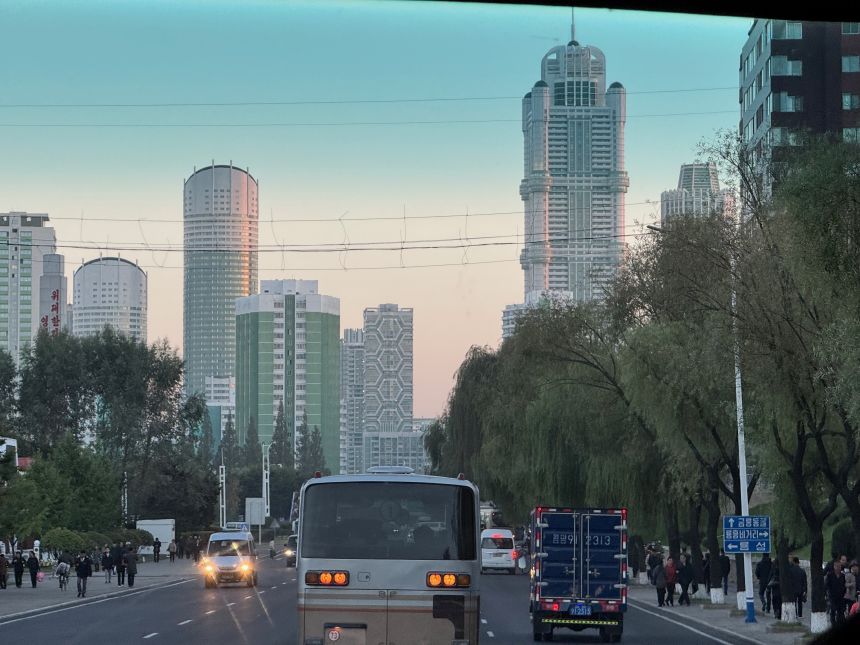 Traffic and high-rise buildings in Pyongyang