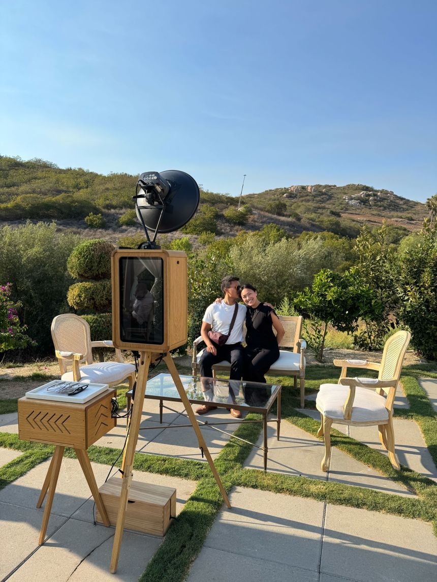 Aguilar and her husband at one of their photo booth setups in California.