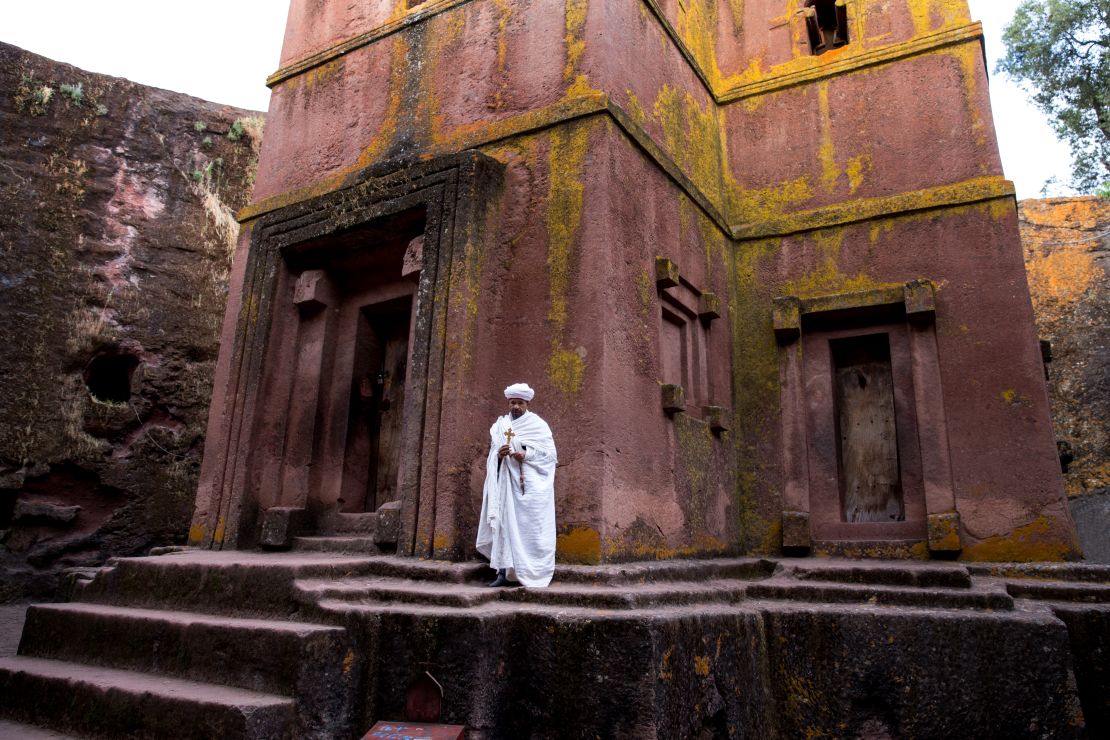 Ninson has traveled around Africa, capturing images including this one, of a priest in front of one of the famed Lalibela churches in Ethiopia.
