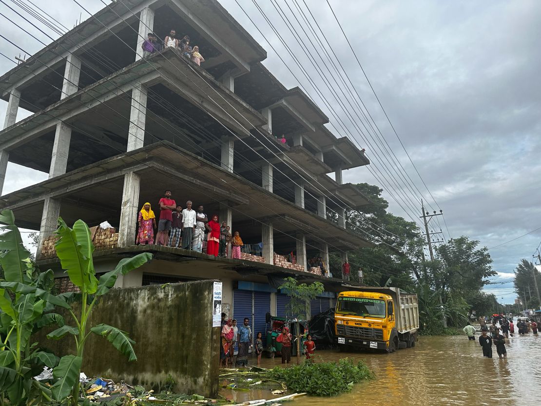 People in Feni, Bangladesh are seeking shelter from flooding in buildings throughout the city.