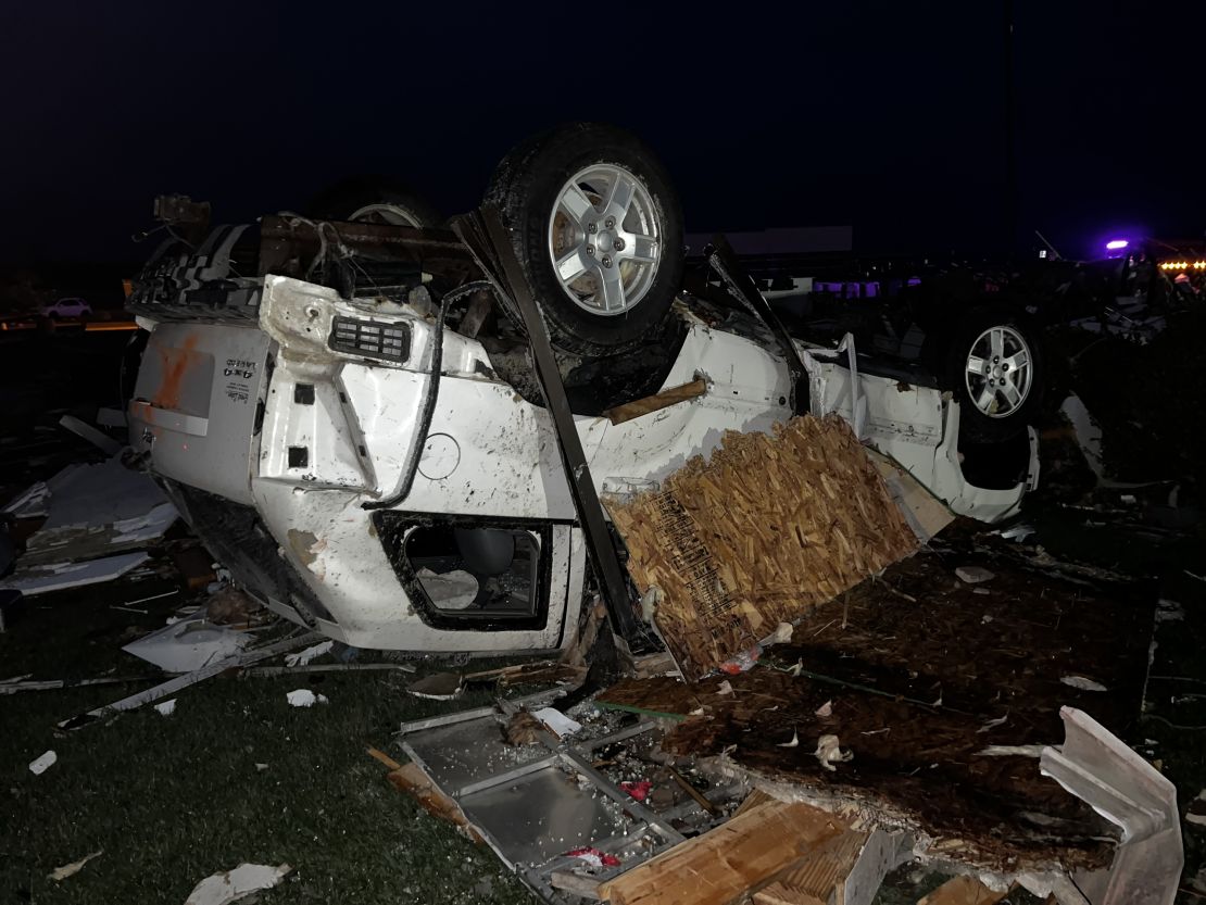 An overturned vehicle in Winchester, Indiana, after severe weather impacted the area Thursday.