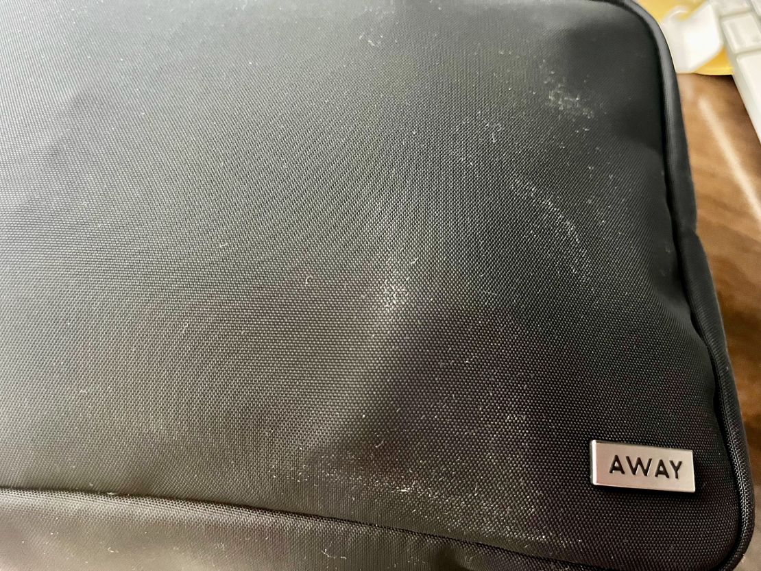 A photo of marks on the side of the Away Hanging Toiletry Bag