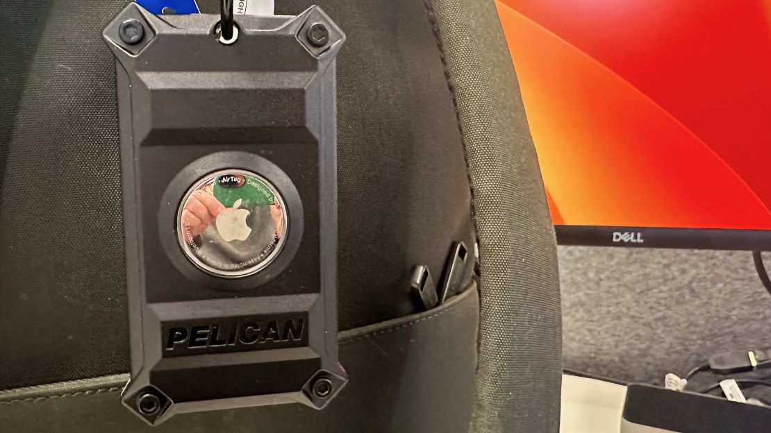 A photo of the Pelican AirTag Luggage Tag on a backpack