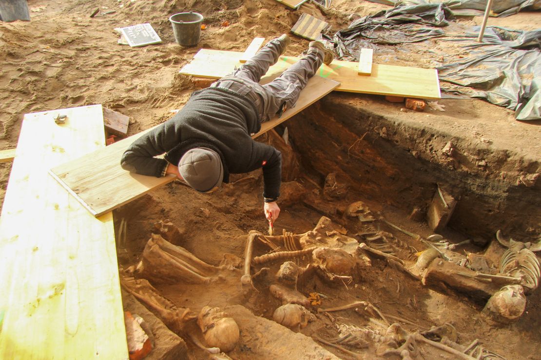 Archaeologists had to work from improvised bridges due to the high density of burials.