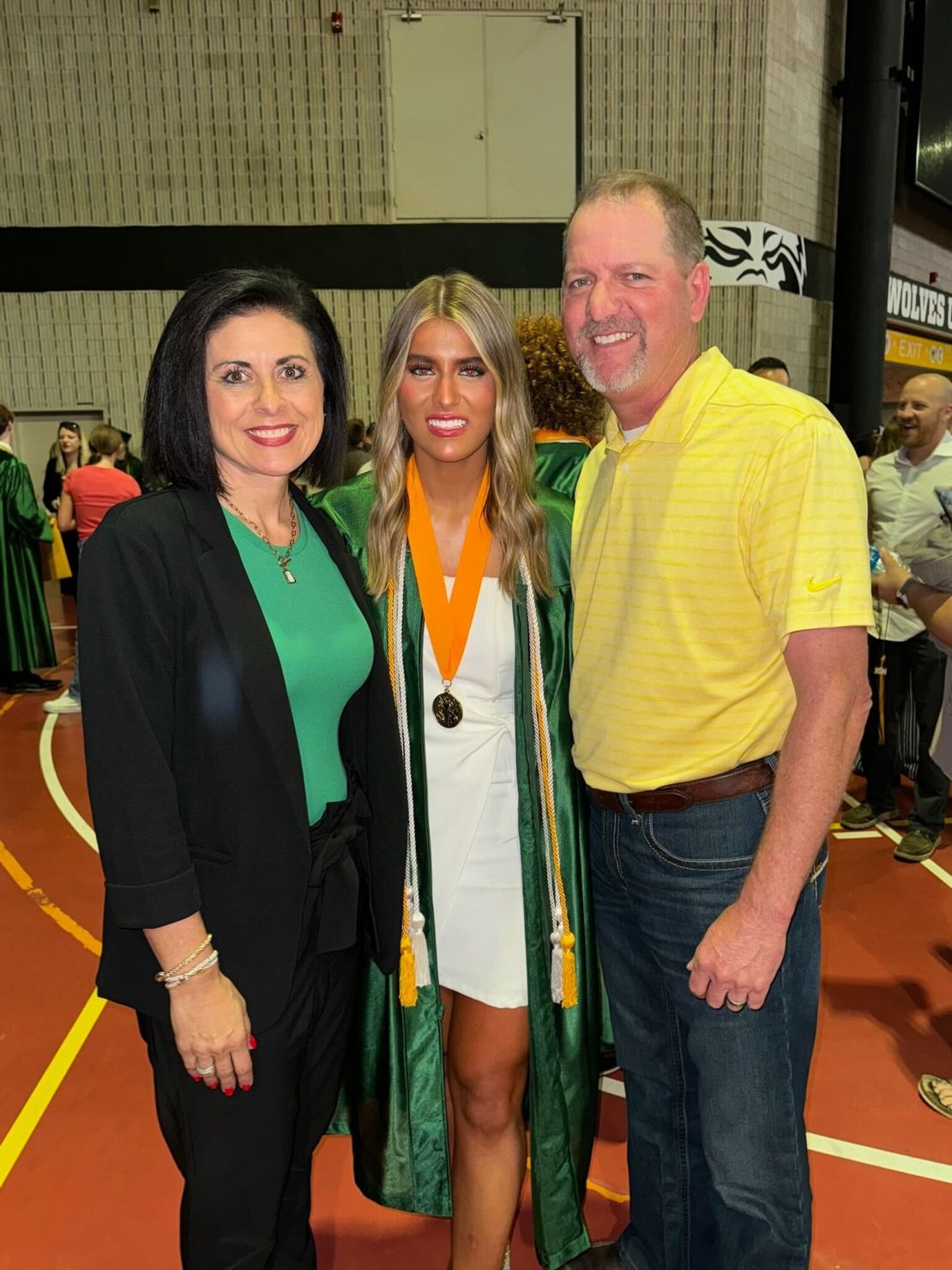 Misty Drope (left), daughter Keely (center) and husband Bruce (right) were unharmed after a tornado destroyed their family home last weekend.