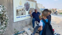 Ali Al-Samoudi outside the entrance of Jenin Camp, in Jenin, West Bank in 2022