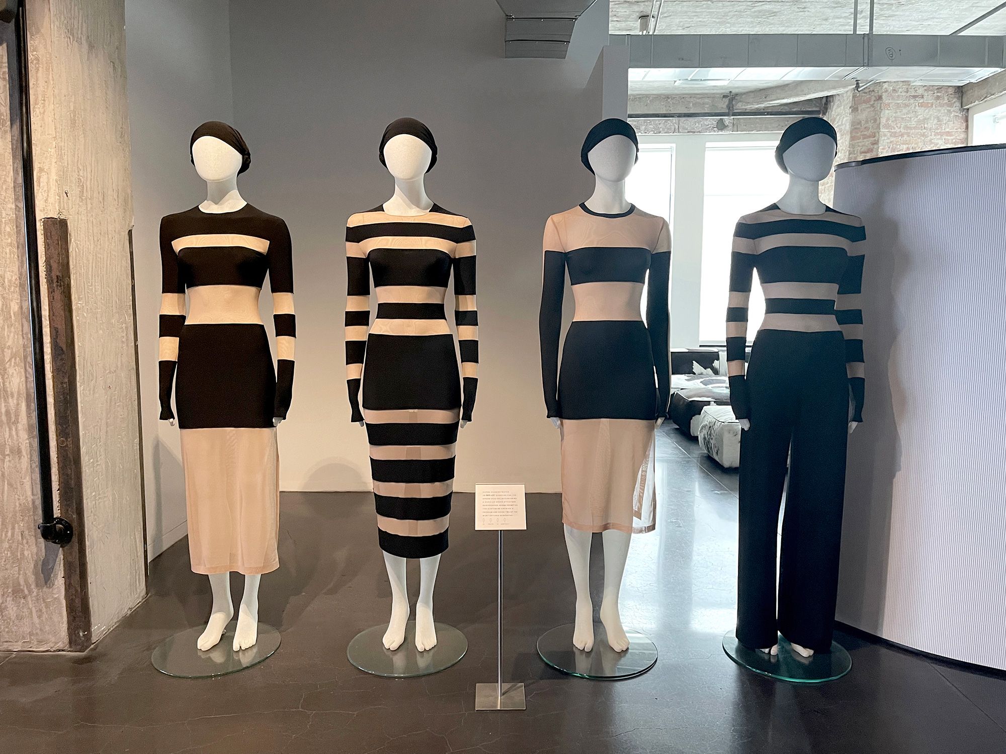 NK X AI dresses are shown far left and second from right.