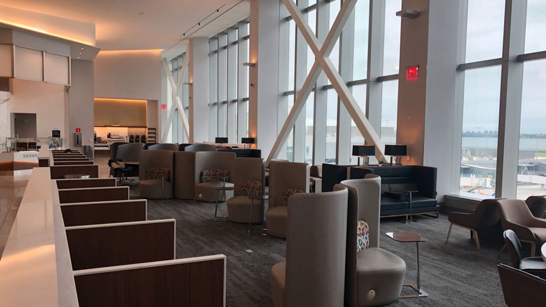 delta sky club laguardia lga seating tall windows