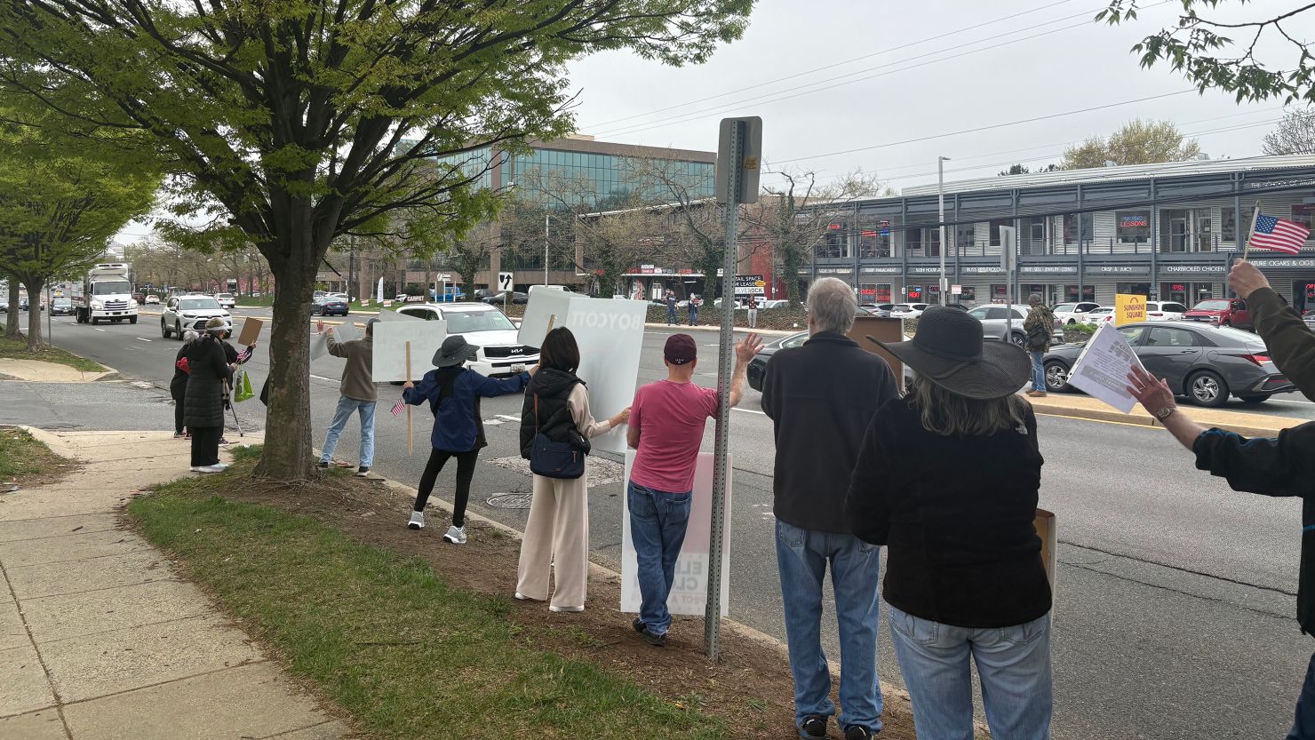 Demonstrators protest at a Tesla showroom in Rockville, Maryland, on April 5, 2025.