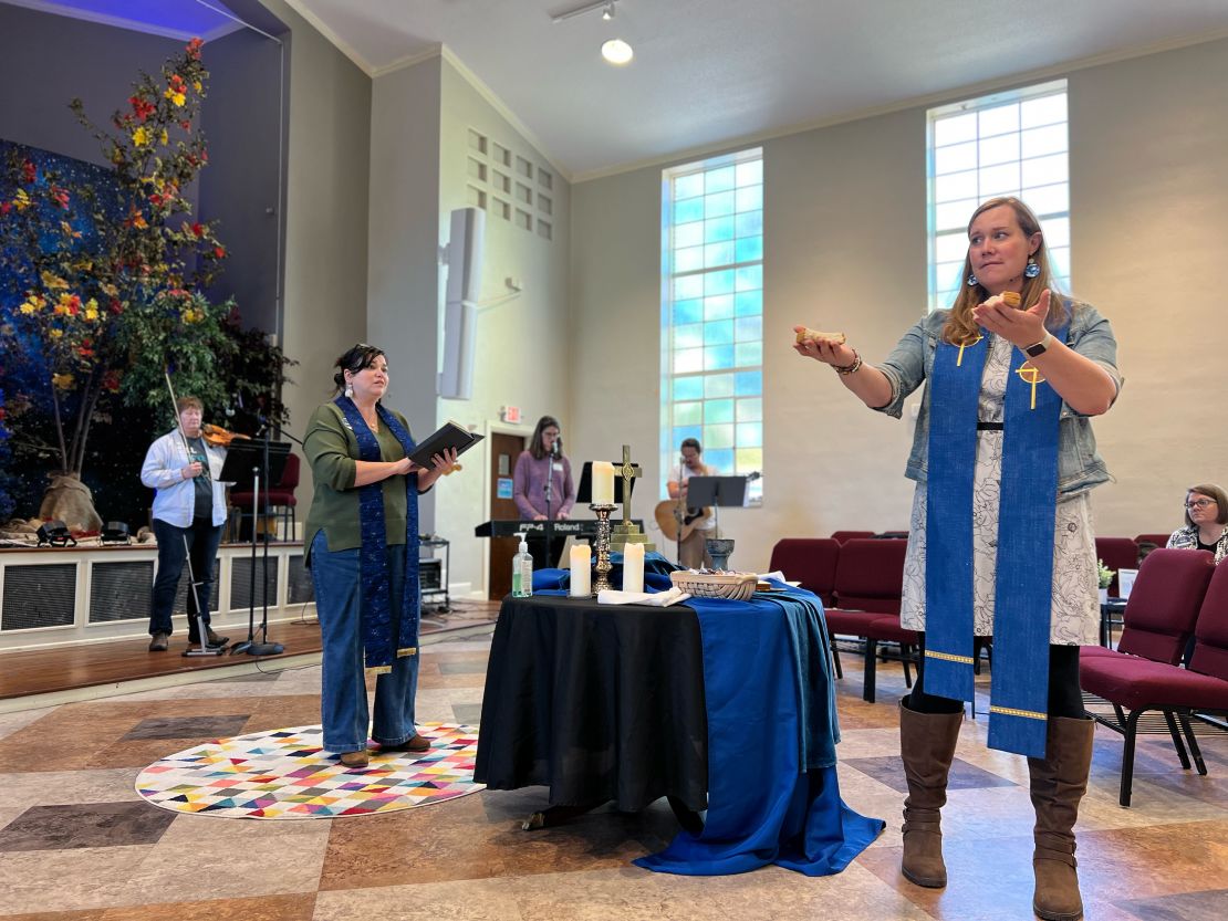 Rev. Anjie Woodworth, left, and Rev. Andi Woodworth during a service at the Neighborhood Church in Atlanta.