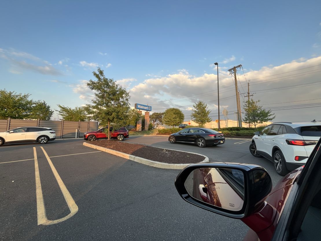 A line of EVs wait to charge at Electrify America chargers in East Brunswick, New Jersey, on July 6.