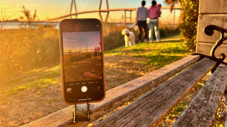 A photo of the Geometrical Pocket Tripod on an outdoor bench at sunset