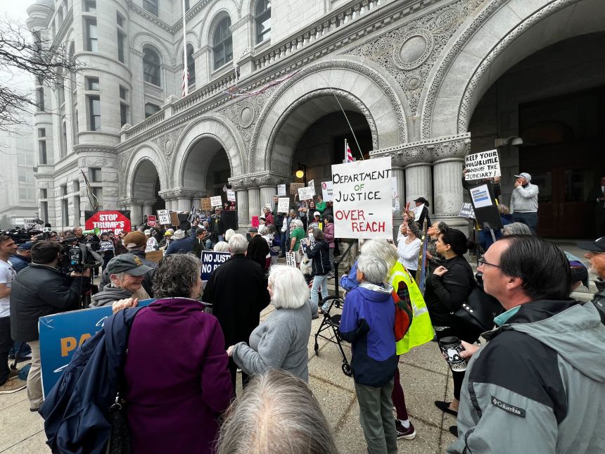 Protesters supporting Judge Hannah Dugan gather outside the federal courthouse in Milwaukee on Thursday before her arraignment.