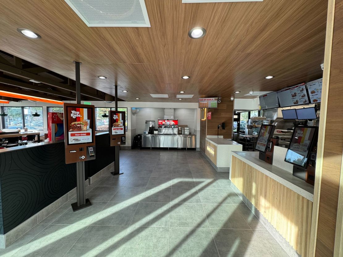 Harsh Ghai said he will putting self service kiosks directly on the front counter of restaurants, like at this burger King location, with the aim to remove registers completely.