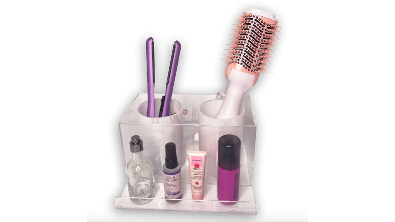 Hair brush outlet organizer