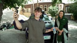 Isobel Yeung speaks with influencer Keith Sinclair in Kabul, Afghanistan.