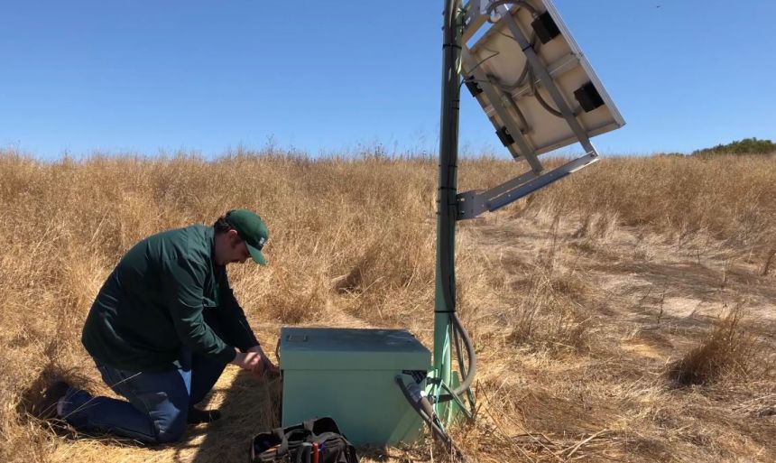 A USGS electronics technician performs maintenance on a ShakeAlert Earthquake Early Warning sensor station in the San Francisco Bay Area.