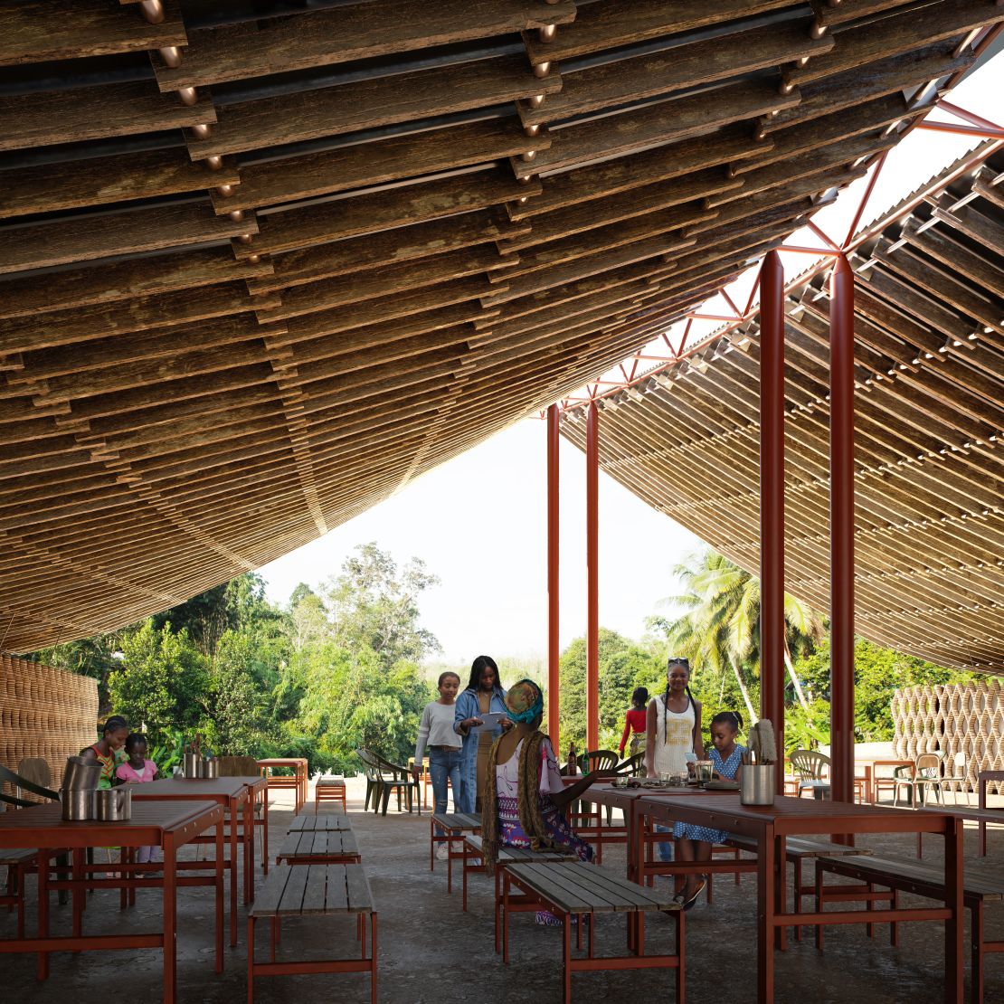 A rendering shows the planned design for the roof of the community center, which will utilize locally-sourced timber, crafted into an interlocking design that will be constructed on the ground and "draped" over the metal supports like a tent.