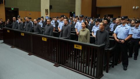 A Chinese court sentencing 11 people to death for running a family-run criminal empire in Myanmar and for killing workers who tried to escape in Zhejiang, China on September 29, 2025.
