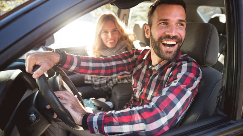 Couple traveling in a car