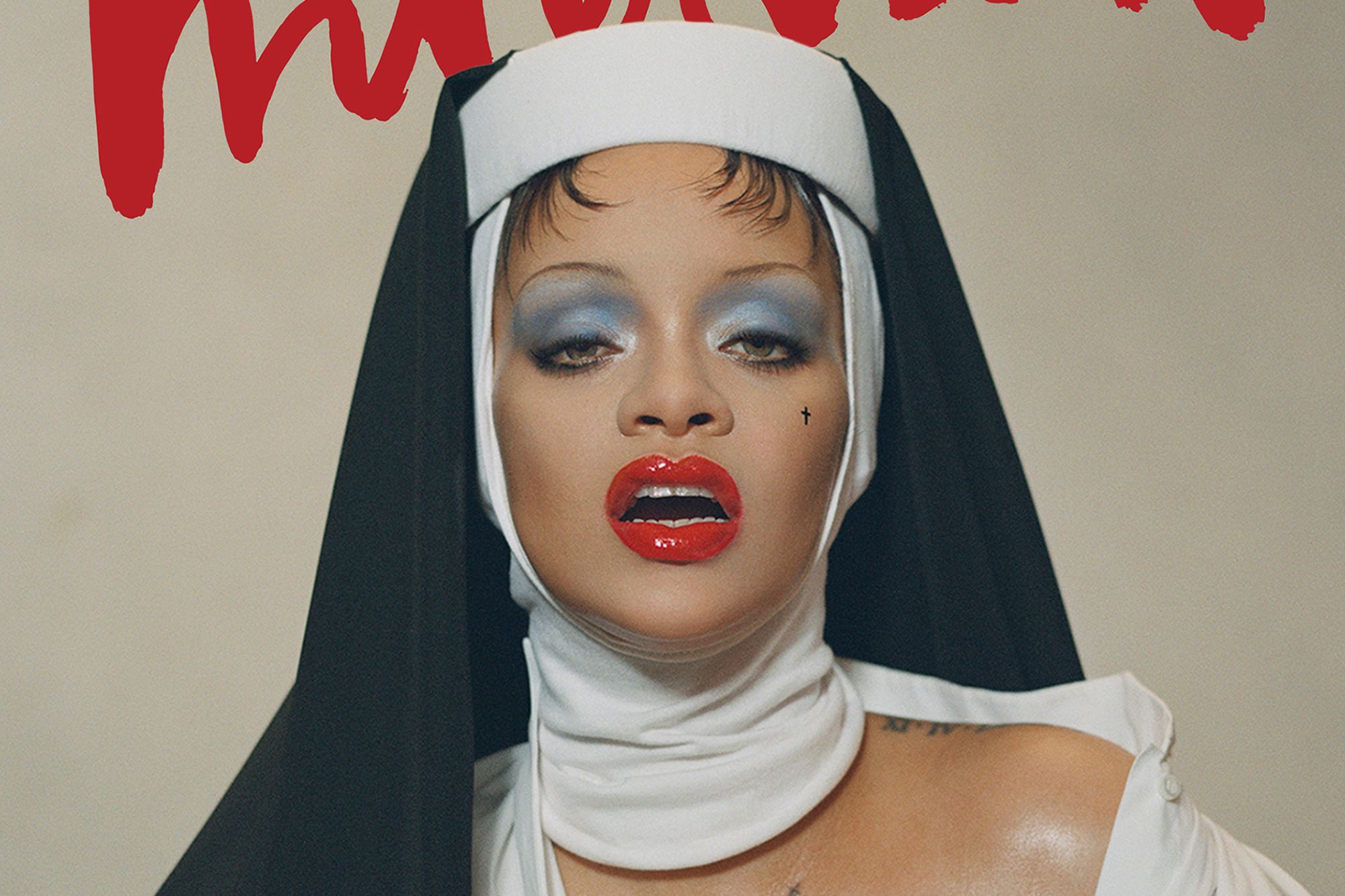 Rihanna is gracing the new cover of Interview magazine, dressed in a skin-baring Dior shirt and a custom wimple from milliner Sarah Sokol.