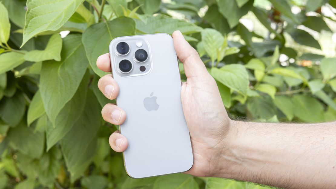 Natural Titanium iPhone 16 Pro in hand