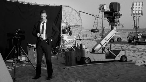 Actor Matthew McConaughey pauses on a Zuma Beach set in Malibu, California.
