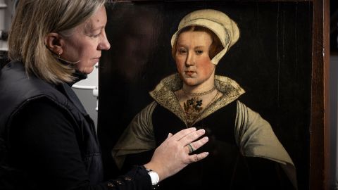 EMBARGOED 00.01 FRIDAY 7 MARCH: Is this the face of Lady Jane Grey? English Heritage Conservator Rachel Turnbull gives this mysterious portrait a final examination before it goes on display from today (7 March) at Wrest Park in Bedfordshire. New research by English Heritage, including dendrochronology (tree ring dating), XRF and infra-red reflectography, has provided compelling evidence in favour of confirming the mysterious portrait as depicting the infamous ‘Nine Days Queen’ - it would be the only known depiction painted during her lifetime. From the newly discovered evidence of a once more elaborate costume and the dating of the wooden panel from within her lifetime, to the deliberate scratching of her eyes, ears and mouth, it is possible that we are looking at the shadows of a once more royal portrait of Lady Jane Grey, toned down into subdued, Protestant martyrdom after her death. The portrait, on loan from a private collection, is on display from today at Wrest Park in Bedfordshire, alongside six other paintings including one of Wrest’s most prominent owners, Jemima Marchioness Grey.