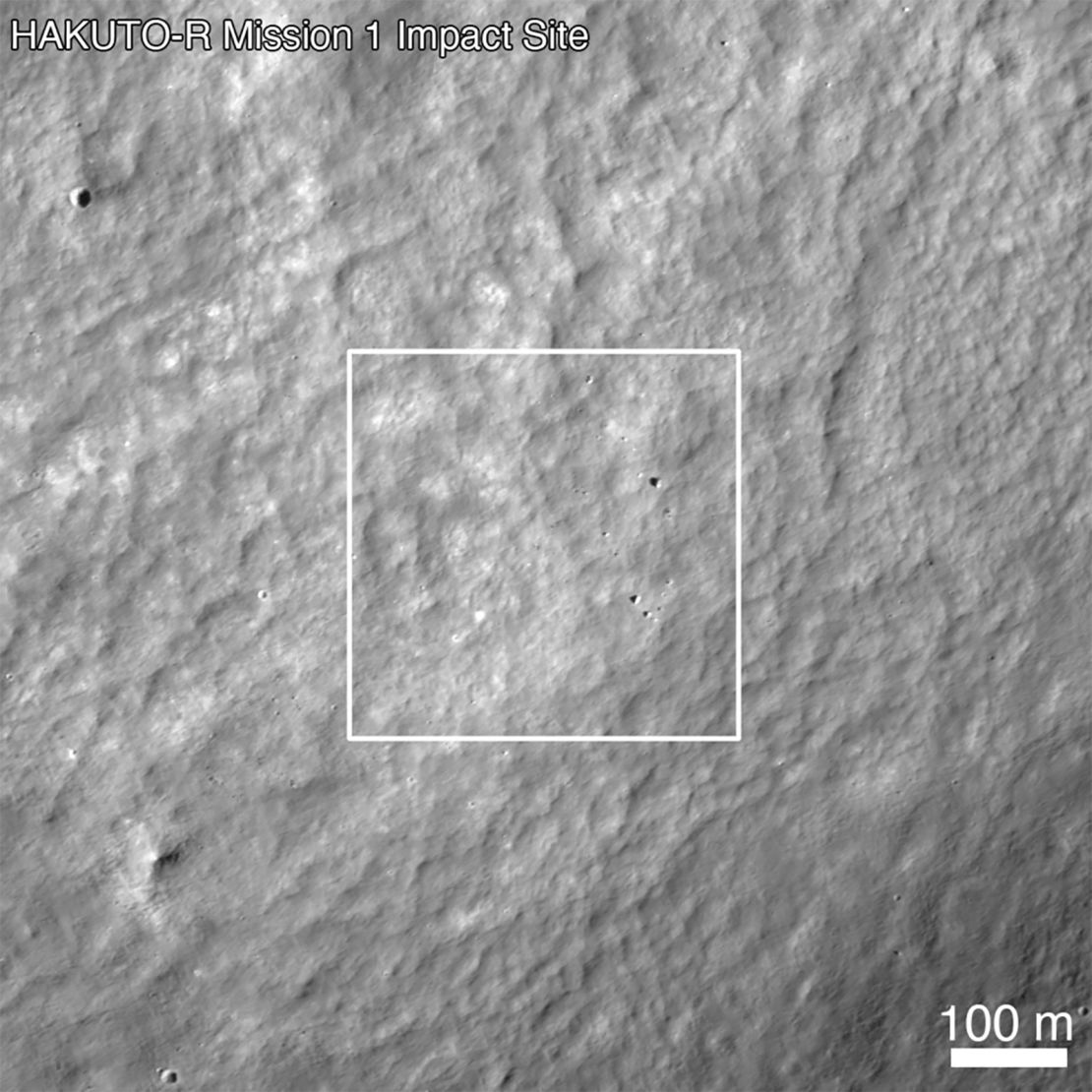 The target landing site of the Ispace Hakuto-R lunar lander's first mission is captured by the Lunar Reconnaissance Orbiter Camera on April 26, 2023, the day after the attempted landing. The scale bar is 328 feet (100 meters) across.