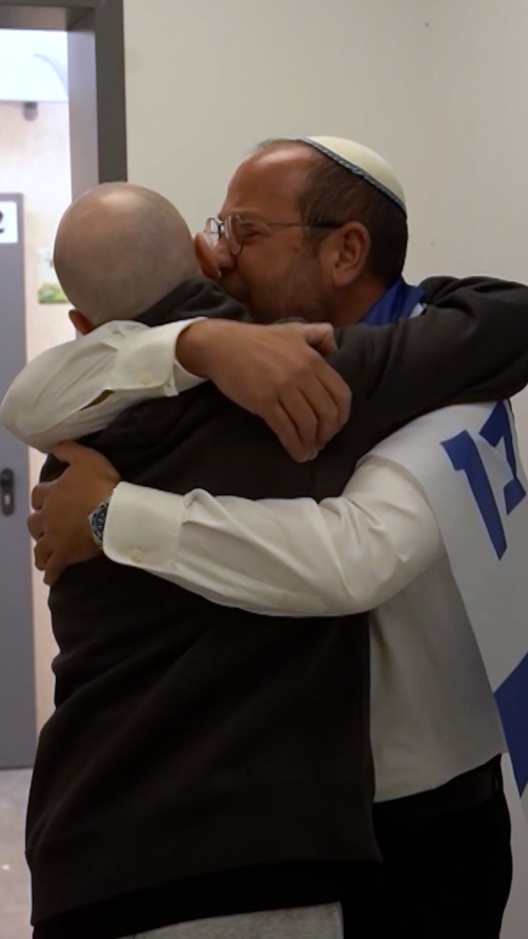 Israeli hostages reunite with families.jpg