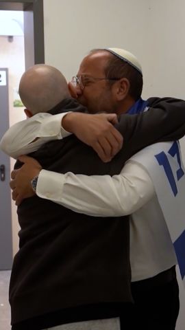 Israeli hostages reunite with families.jpg