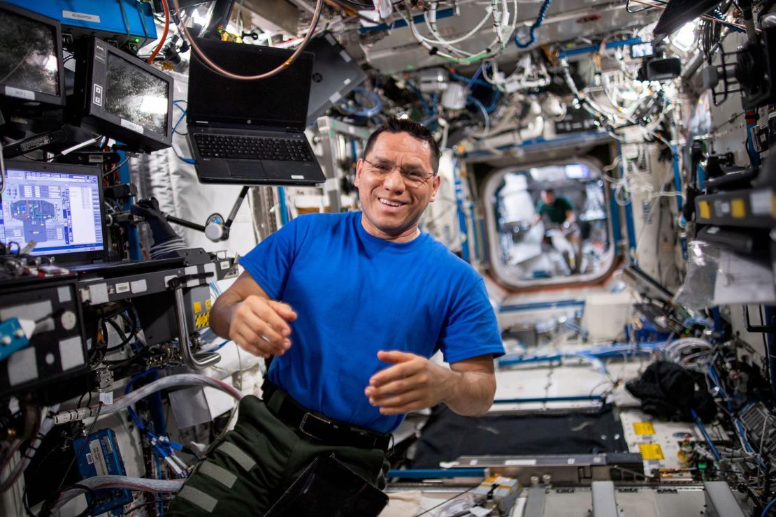 NASA astronaut Frank Rubio works inside the International Space Station's Destiny laboratory module in May 2023.
