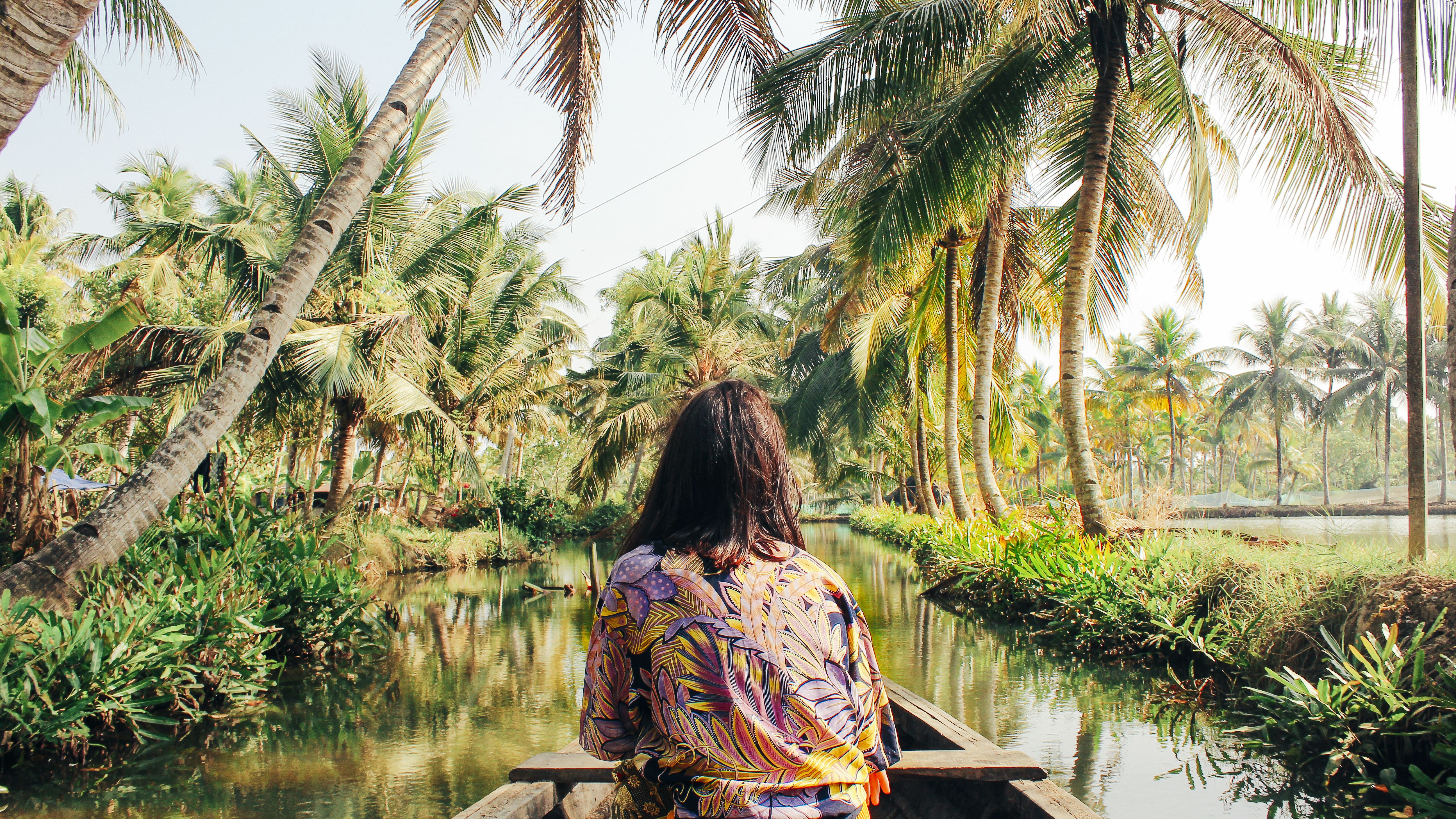 A photo of a person kayaking through Monroe Island in Kollam District, Kerala, South India