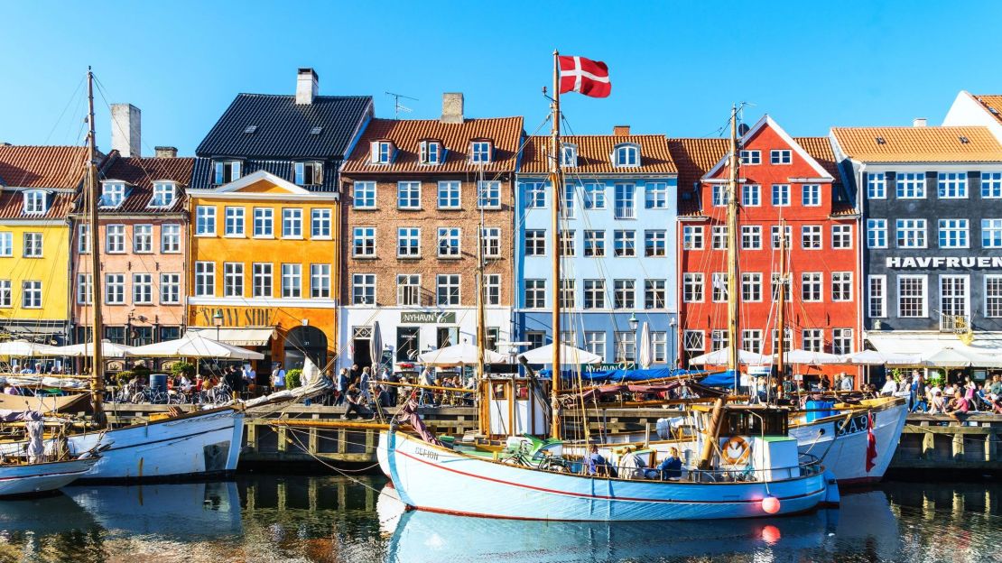 A photo of boats in a canal in Copenhagen's Nyhavn district.