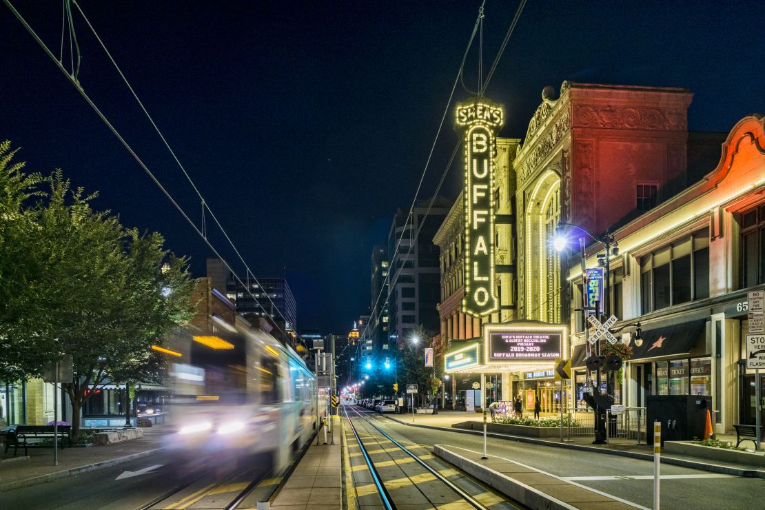 A photo of a streetcar passing through downtown Buffalo, New York