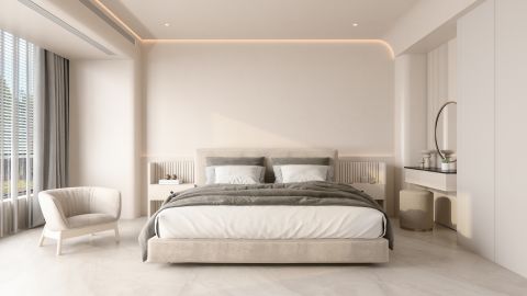 underscored A photo of a luxury hotel room with a large bed and an armchair