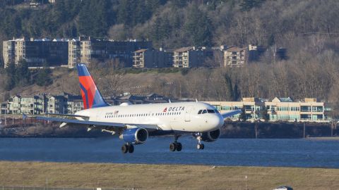 A photo of a Delta Air Lines Airbus A319 landing in Portland International Airport (PDX)