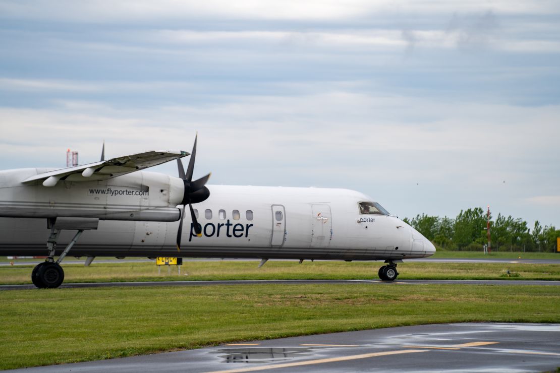 A photo of a Porter Airlines prop-jet on the runway in Toronto