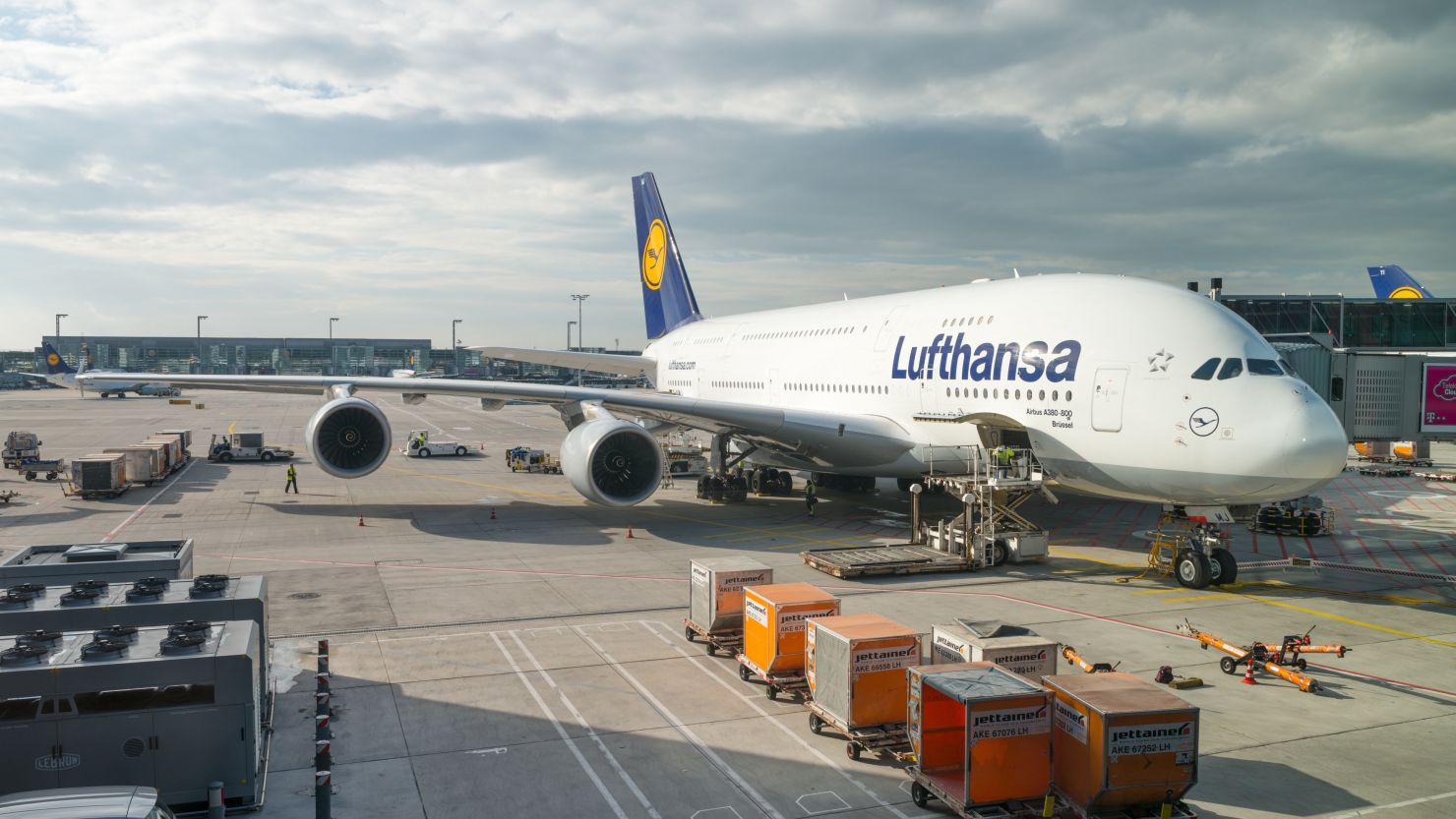 A photo of a Lufthansa Airbus A380-800 at the gate in Frankfurt Airport (FRA)