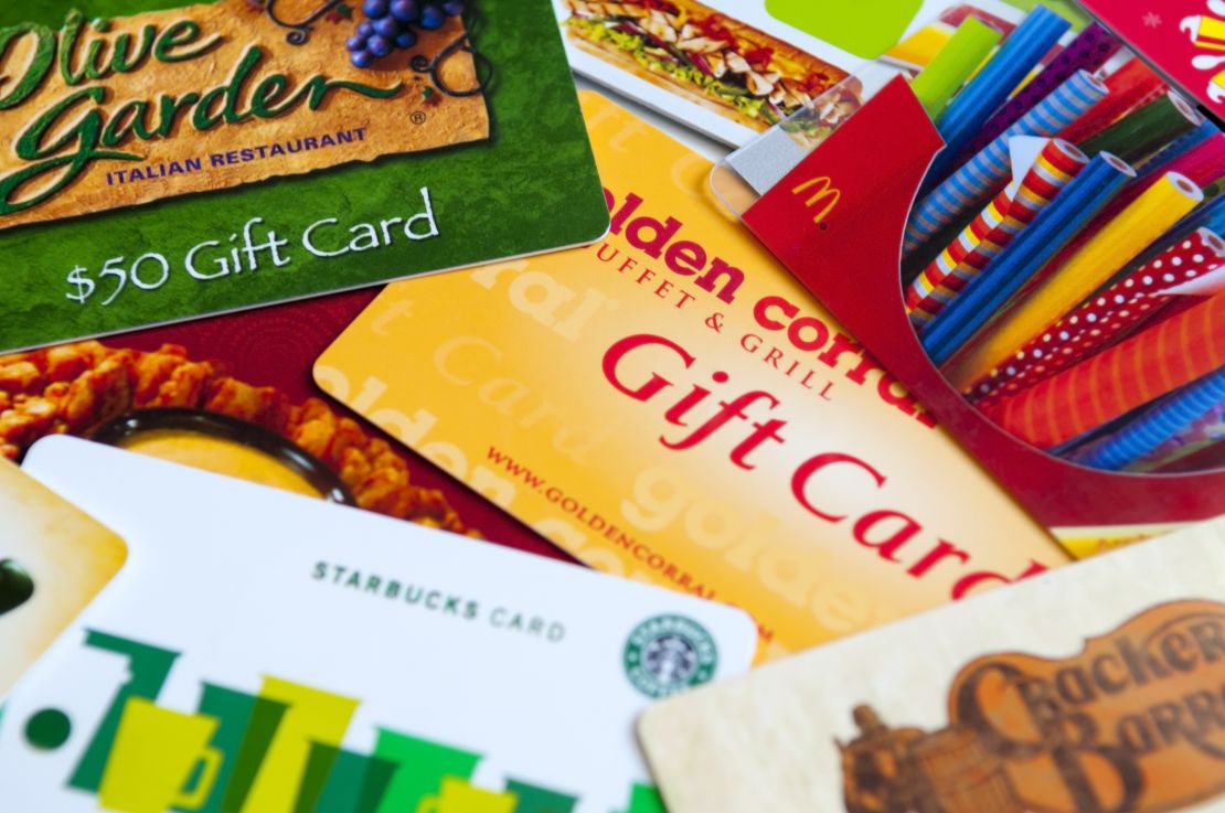 A photo of a variety of restaurant gift cards on a white background, including Cracker Barrel, McDonald's, Olive Garden, Golden Corral, Subway, Outback and Starbucks.
