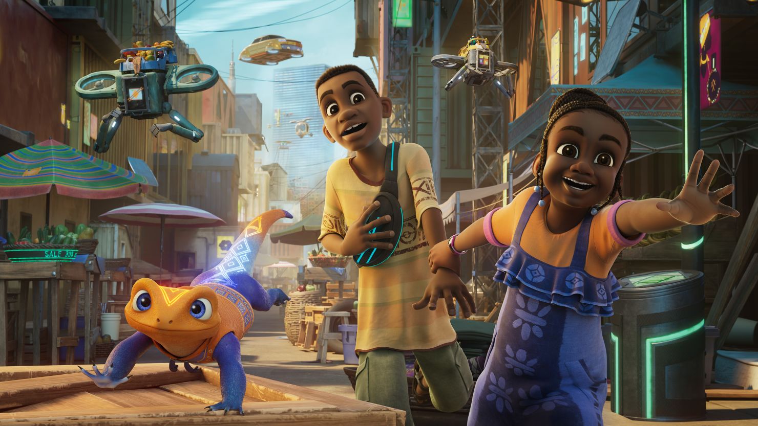 Iwájú is an animated coming-of-age story set in a futuristic Lagos, featuring Tola (right) and her best friend Kole (center), voiced by Nigerian actors Simisola Gbadamosi and Siji Soetan.