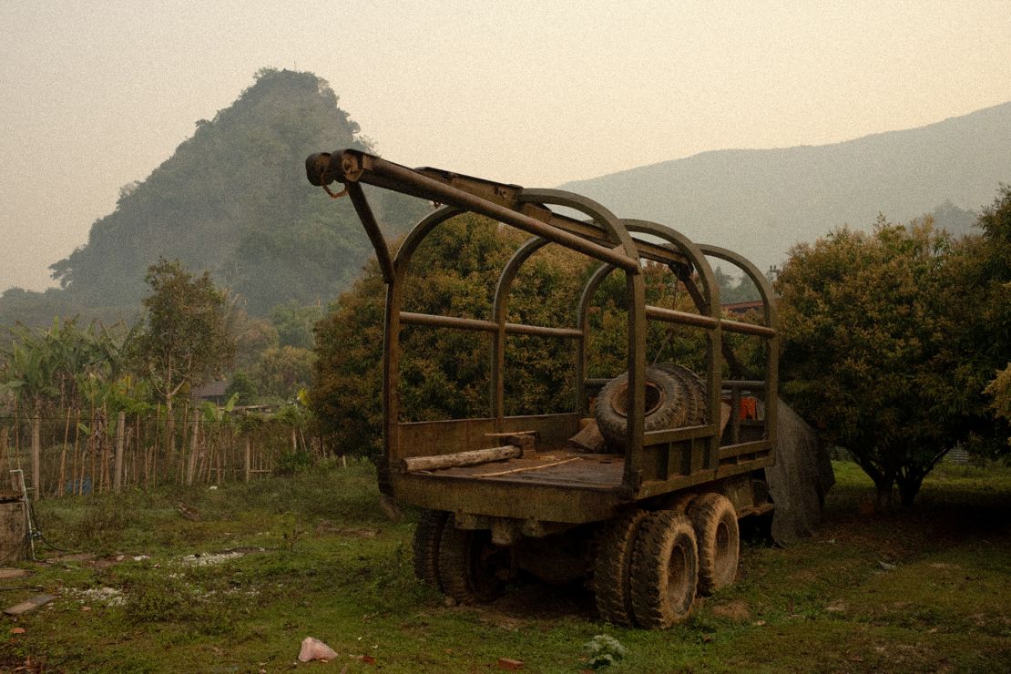 An abandoned military truck sits in the courtyard of General Vang Pao’s home.