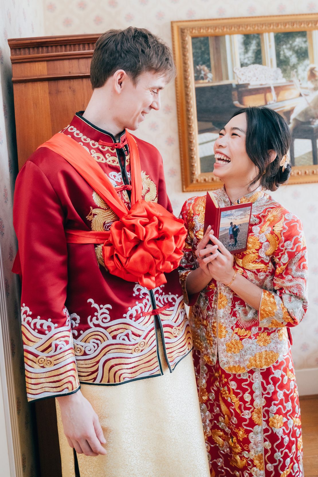 Lau's husband in a complementary Tang suit.