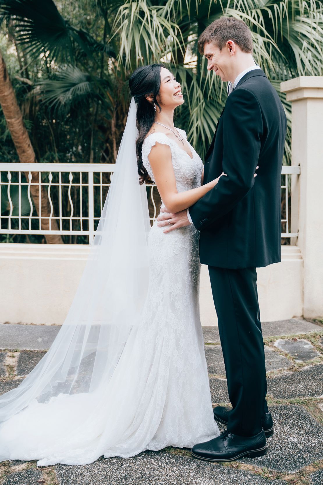 Lau wore a white dress for the drinks reception.