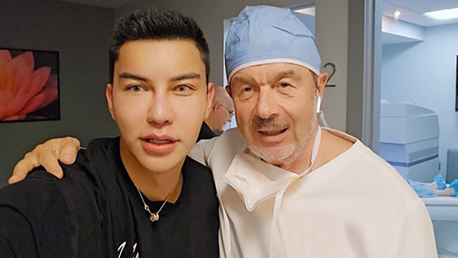 Jack Titus with Dr. Alexander Movshovich, who performed his color-change procedure.